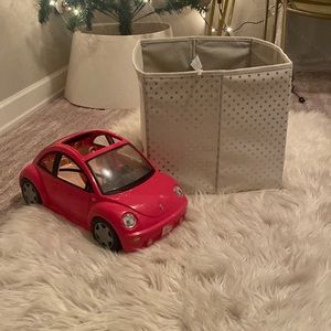 Barbie car and a bun of Barbie’s